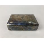 A George V silver cigarette box, maker Wright & Davies, London 1918, stamped Finnigans Ltd, New Bond