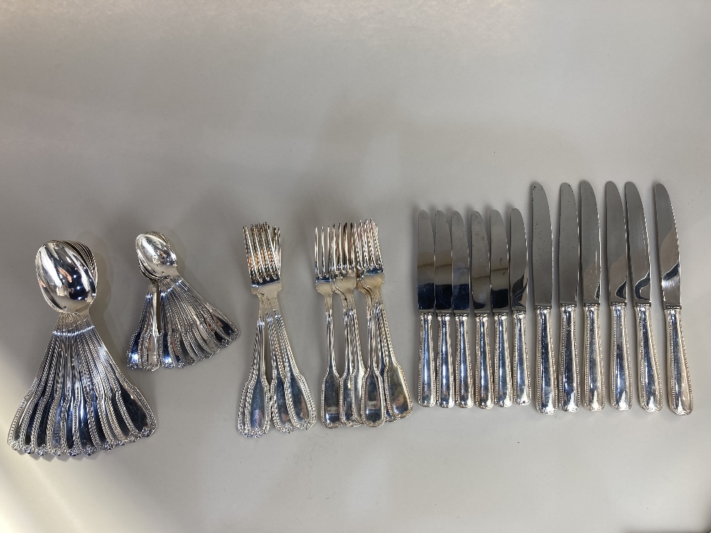 Ten French silver plated tablespoons by Mondial, with eleven matching teaspoons, and four table