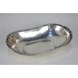 A Greek silver oval dish, with raised scrolling border, stamped 925 handmade (written in Greek) 26cm