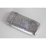 A Victorian silver cigar case with engraved scroll decoration and hinged lid, presentation