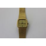 A lady's 18ct gold Omega de Ville automatic bracelet watch