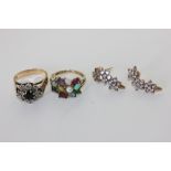 A pearl and gem set cluster ring in 9ct gold, a sapphire ring with a central blue stone and a