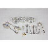 A pair of Edward VII silver cake spoons, Sheffield 1908, a pair of George V silver napkin rings,