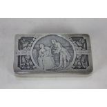 A continental white metal stamp box, hinged lid with scene of a lady musician and gentleman