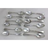 A set of twelve Portuguese silver table spoons rounded terminals with thread borders, Oporto circa