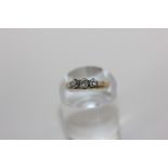 A diamond three stone ring in 18ct white and yellow gold