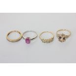 A pink sapphire ring, a diamond half hoop ring and two other gem set rings