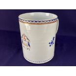 A 19th century armorial porcelain tankard, possibly Chinese, the crossover handles with floral