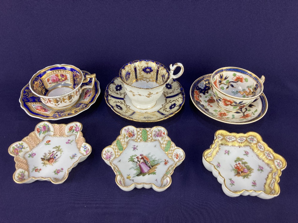 A collection of three Augustus Rex style porcelain pin dishes,