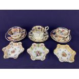 A collection of three Augustus Rex style porcelain pin dishes,