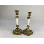 A pair of Louis XVI style ormolu and white marble candlesticks, with acanthus leaf design, 20.5cm