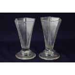 A pair of 18th century jelly glasses, each with tapered hexagonal bowl on domed foot, 10.5cm high (