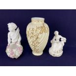 A Moore Brothers schneeballen porcelain vase, formed as a cherub supporting a ball of applied pink