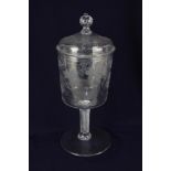 A 19th century glass vase and cover, with air twist stem, etched grape and vine decoration,39cm