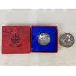 A silver commemorative Churchill Centenary medallion, together with a George V 1910-1935