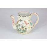 A small pottery teapot, possibly 18th century, decorated with flowers and insects on cream