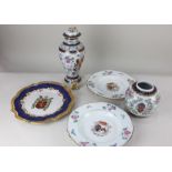 A collection of armorial porcelain, comprising a pair of plates, 24cm diameter, a jar and cover,