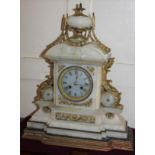A French onyx and gilt metal mantle clock, the dial with Roman numerals, indistinctly marked '