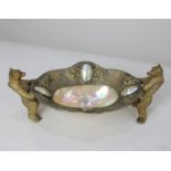 A Victorian gilt metal and mother of pearl dish held by two gilt metal bears, 19cm