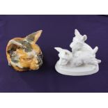 A Continental glazed pottery cat head wall mount, glazed tortoiseshell colouring with impressed mark