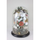 A Victorian display of wax fruit under a glass dome, on circular ebonised base, dome 45cm high (a/