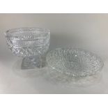 A large cut glass pedestal bowl, together with a moulded glass shallow dish 33cm diameter