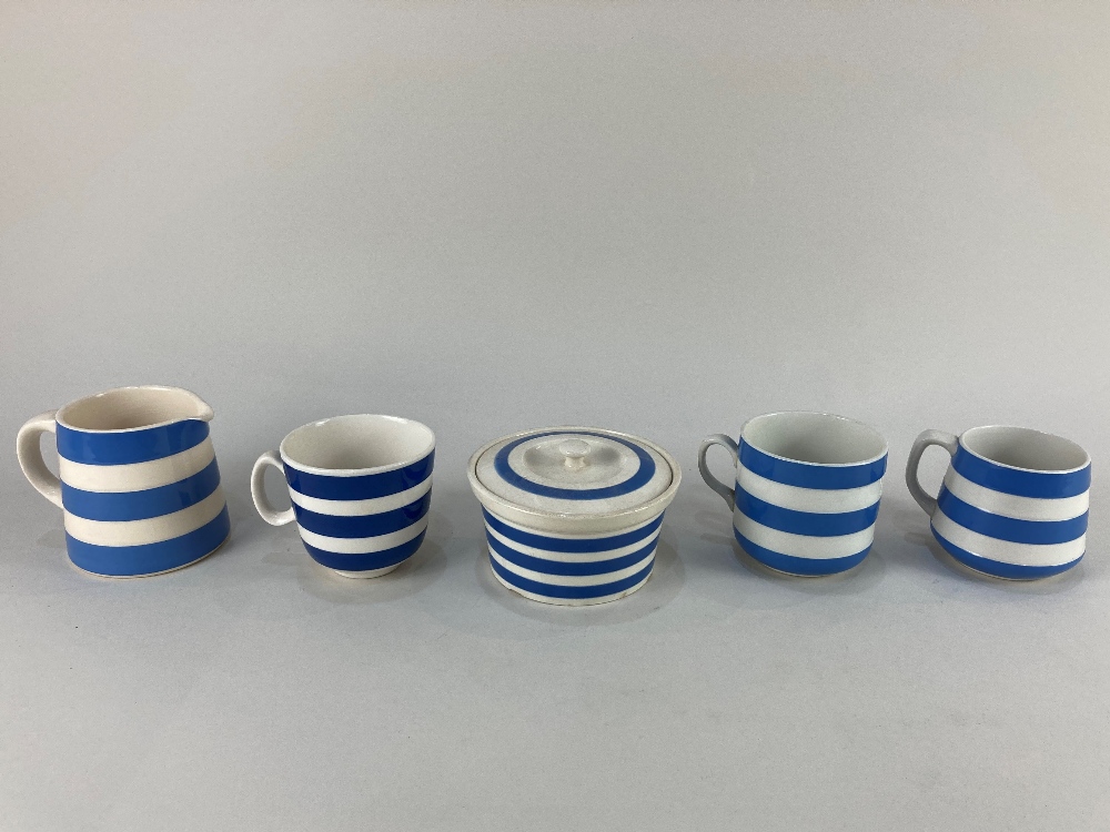 Three pieces of T G Green & Co blue and white striped Cornish Kitchen Ware, comprising two cups, one