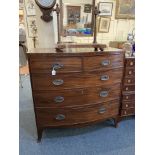 A 19th century mahogany bow front chest of two over three drawers with oval drop handles and