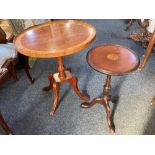 A yew oval occasional table with raised banded border on pedestal stem and four curved legs, 49cm