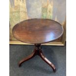 A George III circular tilt top occasional table on tripod base (a/f) 62cm