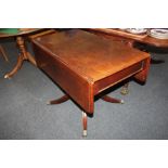 A 19th century mahogany Pembroke table, with frieze drawer and opposing dummy drawer, above turned