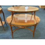 A Sheraton revival inlaid satinwood etagere two glass topped oval tiers with crossbanding and