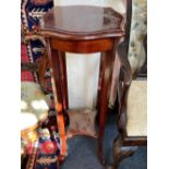 A mahogany jardiniere stand with serpentine moulded top on four flared legs with undershelf 93cm
