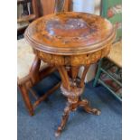 A Victorian walnut needlework table with marquetry inlay, hinged lid, silks box, with three shaped