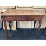 A 19th century mahogany rectangular tea table with fold over top on four square tapered legs, (