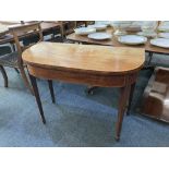 A George III mahogany card table with satinwood cross banding, boxwood and ebony line inlay, on