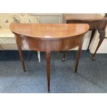A 19th century mahogany demi-lune side table, on square tapered legs, 85cm