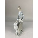 A rare early Lladro porcelain figure of a peasant girl with sheep, unmarked, circa 1960, 32cm high