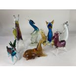 A collection of seven various coloured glass models of animals, to include a Murano glass donkey,