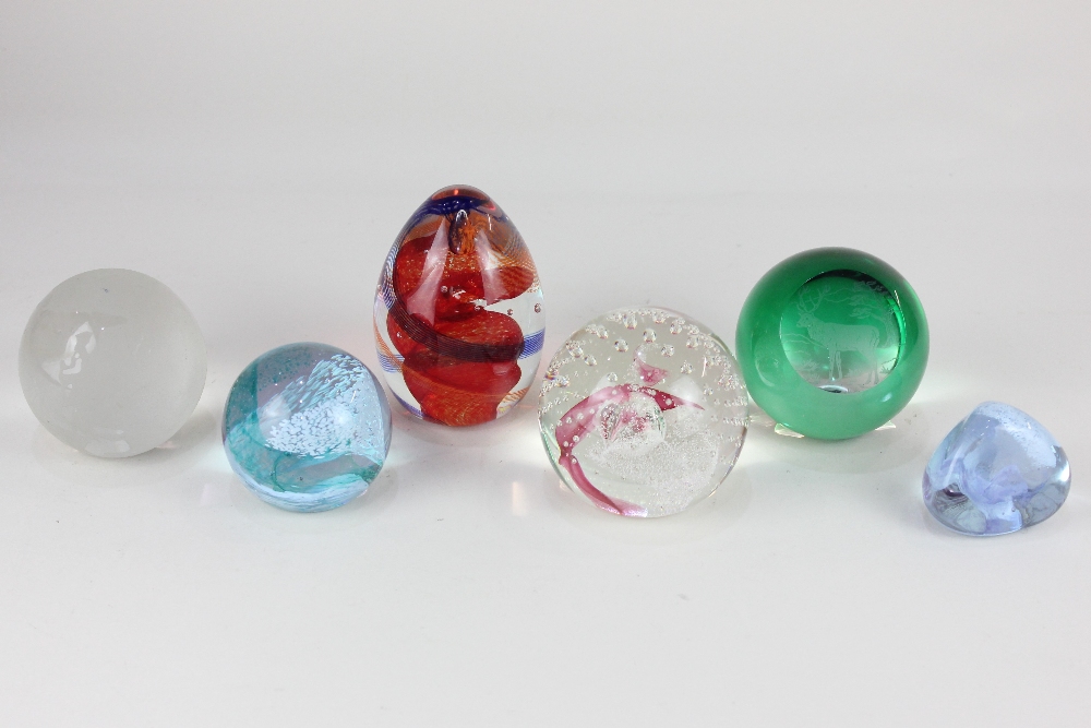 Four Caithness glass paperweights, comprising 'Scarlet Twister', 'Pink Champagne', 'Pastel' and '