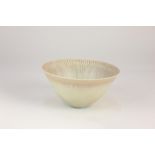 A Stig Lindberg for Gustavsberg, Sweden conical bowl, cream glaze with radiating horizontal lines to