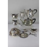 A Mappin & Webb silver plated teapot and milk jug, a silver plated warming muffin dish, a teapot,