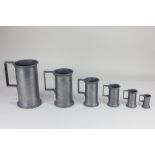 A set of six French pewter measures, comprising litre, demi litre, double litre, decil, demi