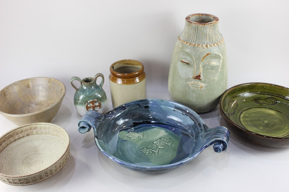 A collection of pottery and stoneware bowls and vases, to include a Canterbury pottery two handled
