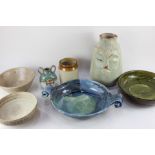 A collection of pottery and stoneware bowls and vases, to include a Canterbury pottery two handled