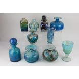 Three Mdina glass vases and stoppered bottles, together with an Isle of Wight glass bottle, and a