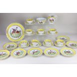 A Chelsea style porcelain part tea set, decorated with exotic birds within yellow borders and gilt
