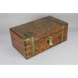 A brass bound walnut writing slope, with green baize lined interior and two glass inkwells (