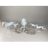 Five porcelain models of animals, two Aynsley models of a seated pig and a sow with piglets, and