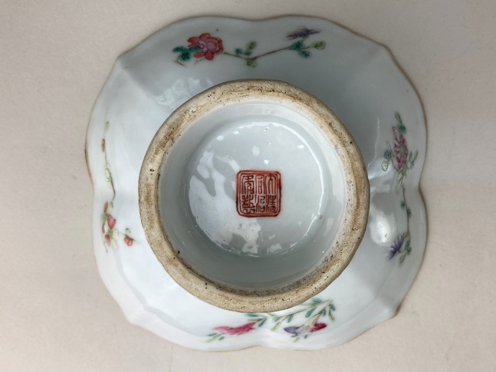 A small Chinese porcelain dish, with lobed rim, raised on a circular foot, decorated with - Image 3 of 3
